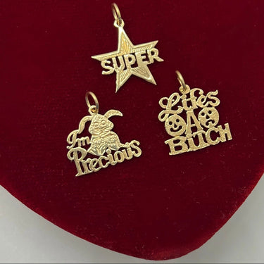 'Life's a Bitch' Charm