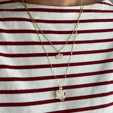 'Life's a Bitch' Charm