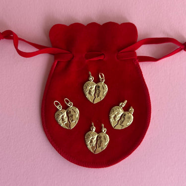 Man and Woman Breakable Heart Pendant