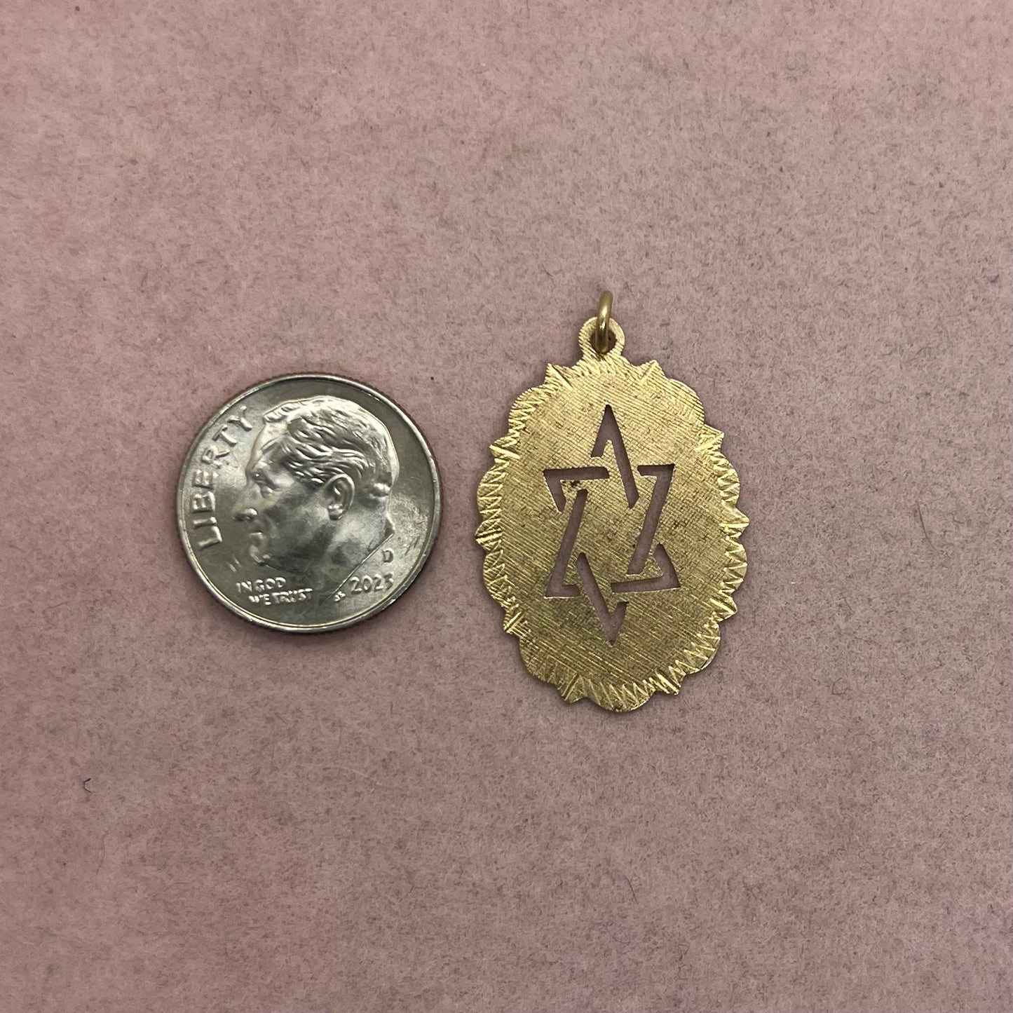 Star of David Cut-Out Oval Medallion