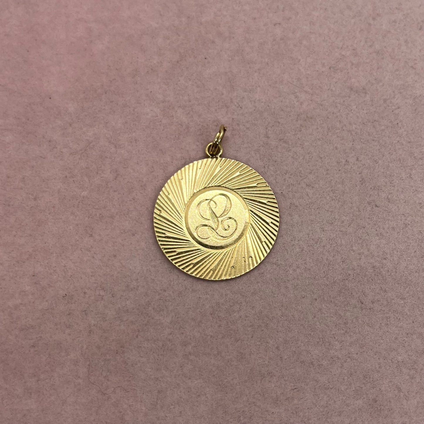 Engine-Turned L Medallion