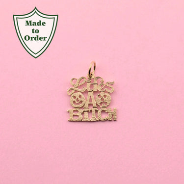 'Life's a Bitch' Charm
