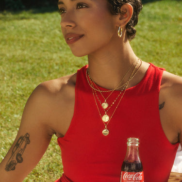 Enjoy Coca-Cola Silhouette Medallion