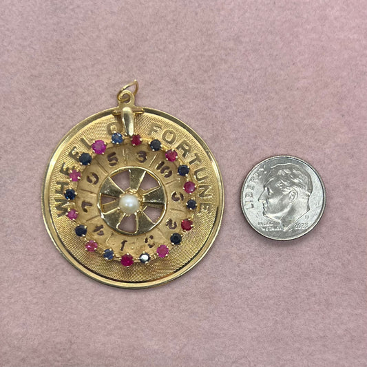 Spinning Wheel of Fortune Medallion