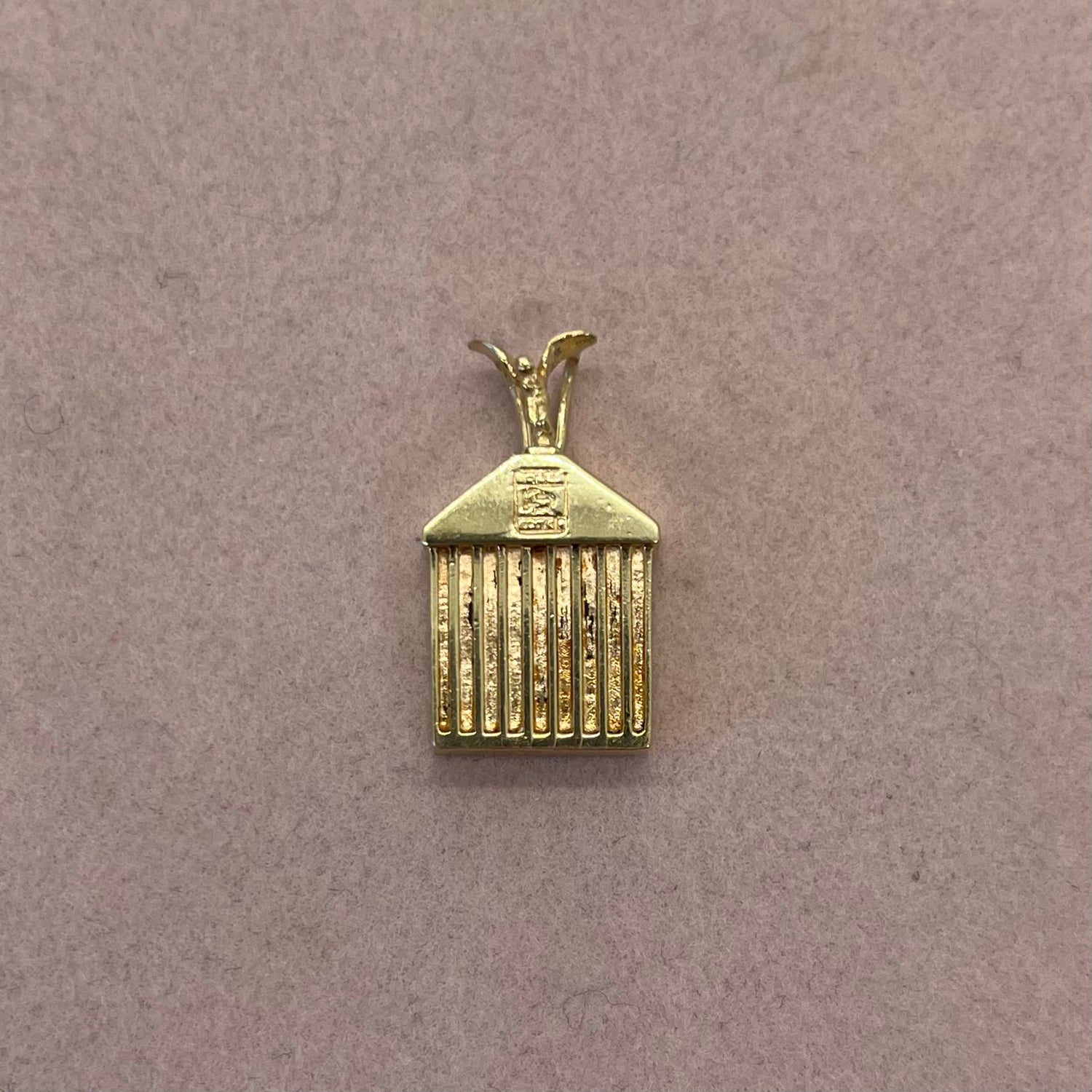 Rolls royce clearance gold pendant